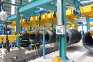 تولید انبوه میلگرد کلاف در مجتمع معدنی و صنعت آهن و فولاد بافق آغاز شد