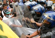 پلیس فیلیپین با معترضان به سفر آسیایی «جو بایدن» درگیر شد