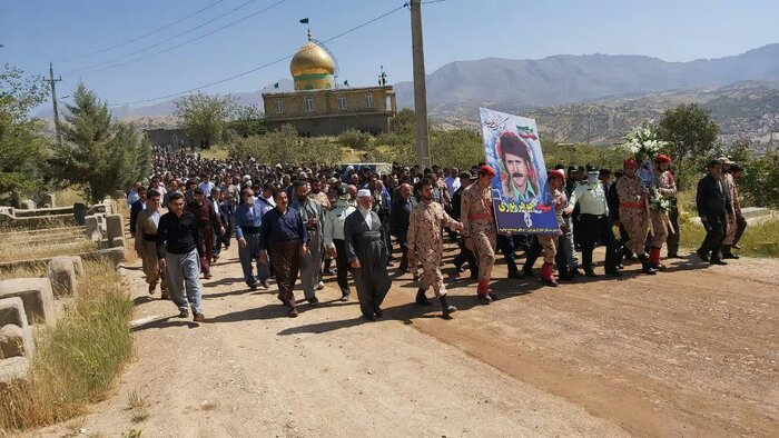 پیکر «جوهر نوری» شهید تازه تفحص شده در جوانرود تشییع شد