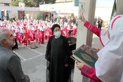 President Raisi rings opening bell of new school year