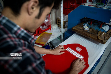 Name of Pirouz on T-shirts of fans of Iran soccer team