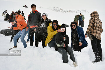 People in western Iran enjoy snowfall