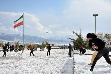 People in western Iran enjoy snowfall