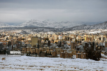 People in western Iran enjoy snowfall