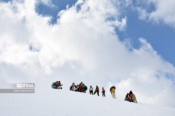 People in western Iran enjoy snowfall