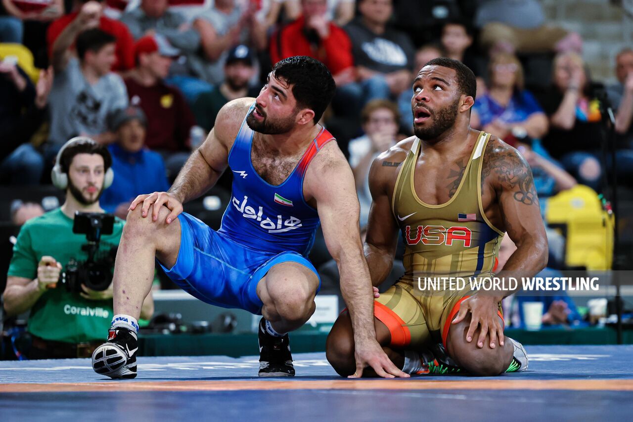 Iranian champion beats world silver medal holder