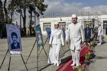 Cérémonie de dépôt de fleurs sur les tombes des martyrs des minorités religieuses en Iran