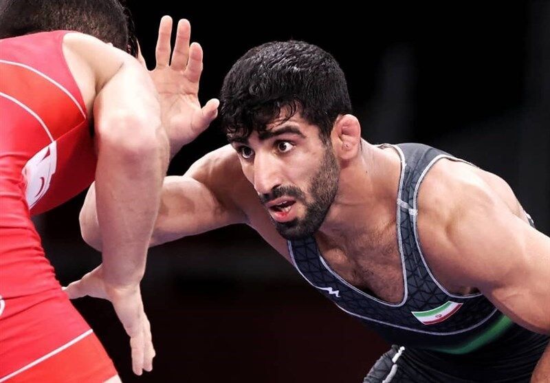 Qiasi beats American free style wrestler to win gold