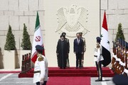 Bashar al-Assad recibe oficialmente al presidente Raisi