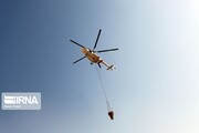 فیلم | آبگیری بالگرد برای مهار آتش در پلدختر