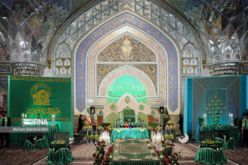 Replacement of flag of Imam Reza shrine in northeast Iran