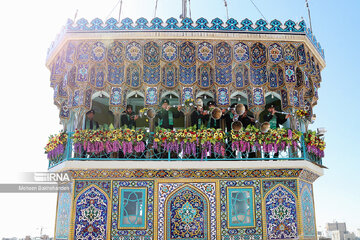 Replacement of flag of Imam Reza shrine in northeast Iran