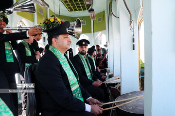 Replacement of flag of Imam Reza shrine in northeast Iran