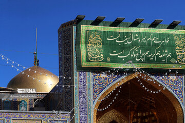 Replacement of flag of Imam Reza shrine in northeast Iran