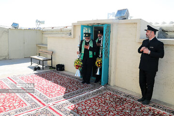 Replacement of flag of Imam Reza shrine in northeast Iran