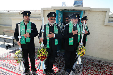 Replacement of flag of Imam Reza shrine in northeast Iran