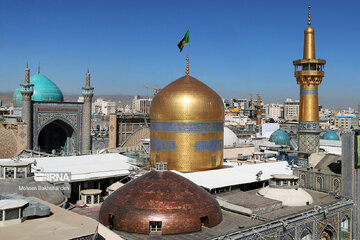 Replacement of flag of Imam Reza shrine in northeast Iran