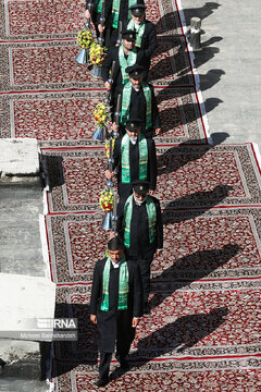 Replacement of flag of Imam Reza shrine in northeast Iran