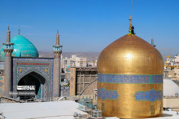 Replacement of flag of Imam Reza shrine in northeast Iran