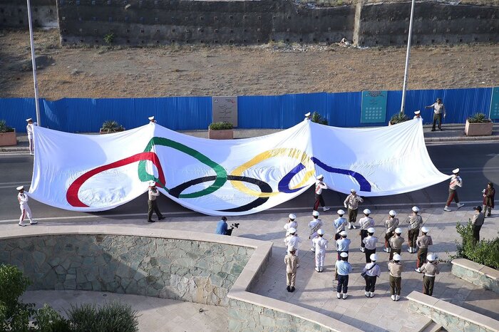 Largest IOC flag hoisted in Iran NOC