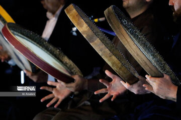 Playing traditional Daf Drum festival in western Iran