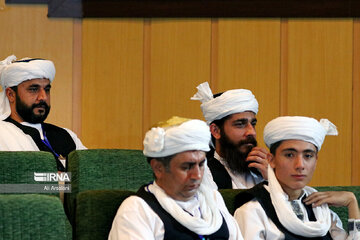 Playing traditional Daf Drum festival in western Iran