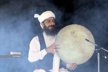 Playing traditional Daf Drum festival in western Iran