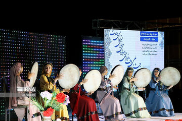 Playing traditional Daf Drum festival in western Iran