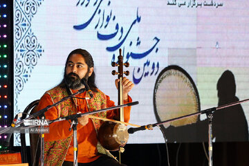 Playing traditional Daf Drum festival in western Iran