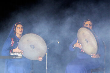 Playing traditional Daf Drum festival in western Iran