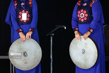 Playing traditional Daf Drum festival in western Iran