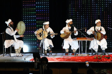 Playing traditional Daf Drum festival in western Iran