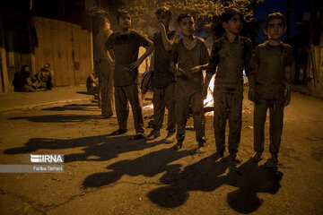 Gel-mali ritual in Ashura in western Iran