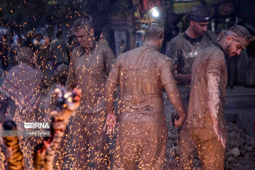 Gel-mali ritual in Ashura in western Iran