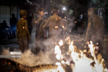 Gel-mali ritual in Ashura in western Iran