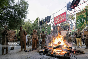 Gel-mali ritual in Ashura in western Iran