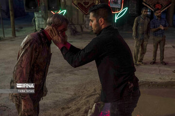 Gel-mali ritual in Ashura in western Iran