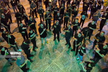 Traditional Dast-e Choobi ritual in Muharram in north Iran