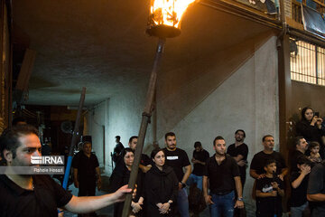 Traditional Dast-e Choobi ritual in Muharram in north Iran