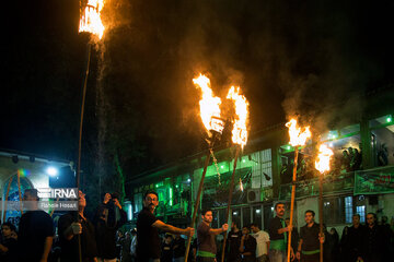 Traditional Dast-e Choobi ritual in Muharram in north Iran