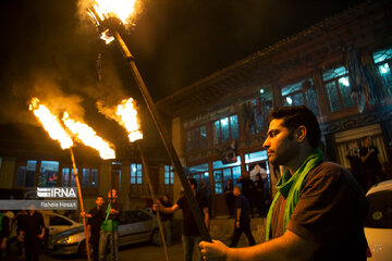 Traditional Dast-e Choobi ritual in Muharram in north Iran