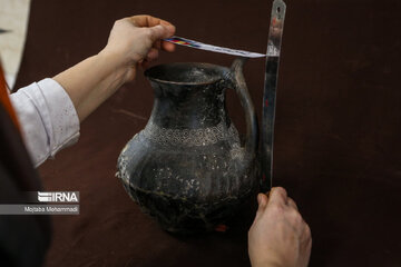 La conservation et la restauration d'objets historiques au musée Rasht, au nord-ouest de l’Iran