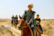 Horse riders heading to Imam Reza shrine in northeast Iran