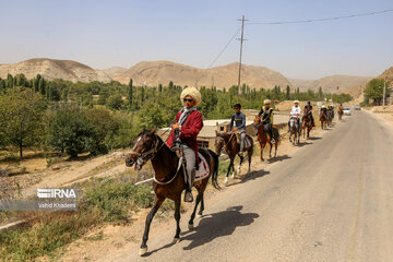 Horse riders on way to Imam Reza shrine