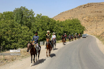 Horse riders on way to Imam Reza shrine