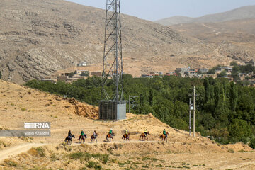 Horse riders on way to Imam Reza shrine