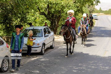 Horse riders on way to Imam Reza shrine