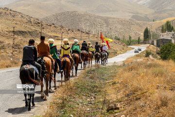 Horse riders on way to Imam Reza shrine