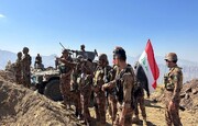 الجيش العراقي والحشد الشعبي يشتبكان مع "داعش" إثر شنه هجوماً مستغلاً العدوان الاميركي