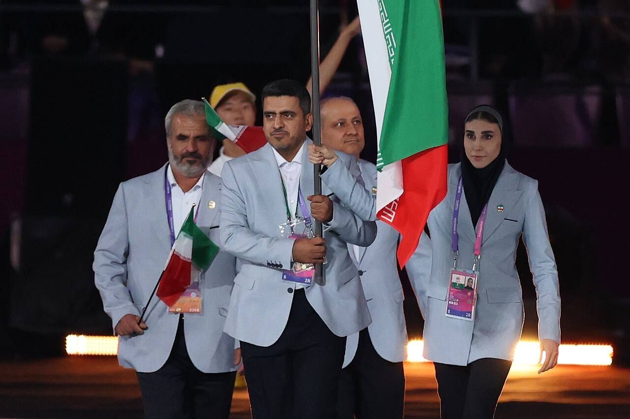 Shooting gold medalist and female world taekwondo champion flagbearers of Iran in Asian Games